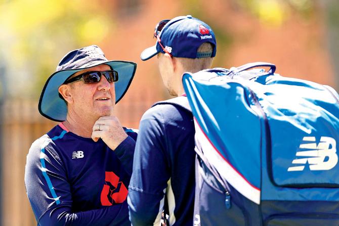 England coach Trevor Bayliss talks to Joe Root during a practice session at the WACA in Perth recently. Pic/Getty Images