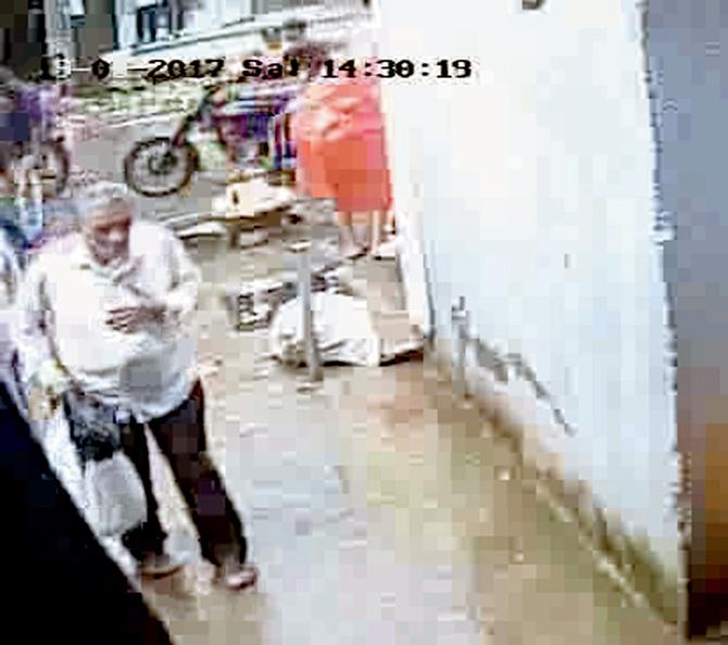 Accused Vijay Adhikari caught on CCTV.