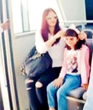 Aishwarya and Aaradhya spotted at Male airport