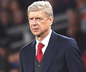 Arsenal's Arsene Wenger gets shareholders backing