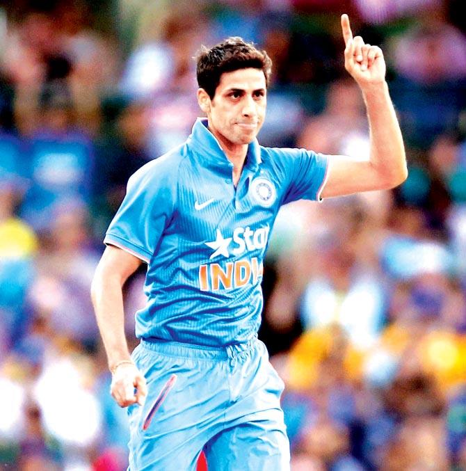 Ashish Nehra celebrates the wicket of Usman Khawaja during the T20I against Australia in Sydney last year. Pic/Getty Images