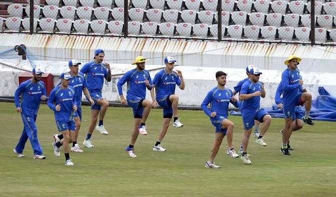 Australian cricket team members run during a training session ahead of the third and final T20 cricket match in a series between India and Australia at the Rajiv Gandhi International Cricket Stadium in Hyderabad. Pic/AFP