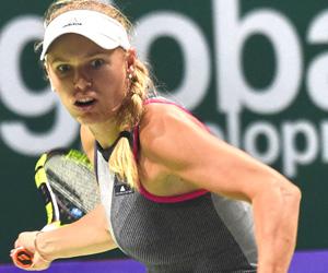 WTA: Simona Halep keen to get back on court after defeat by Caroline Wozniacki