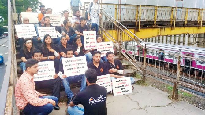 Charni Road residents protest at the station premises to highlight its pathetic state and the problems plaguing commuters