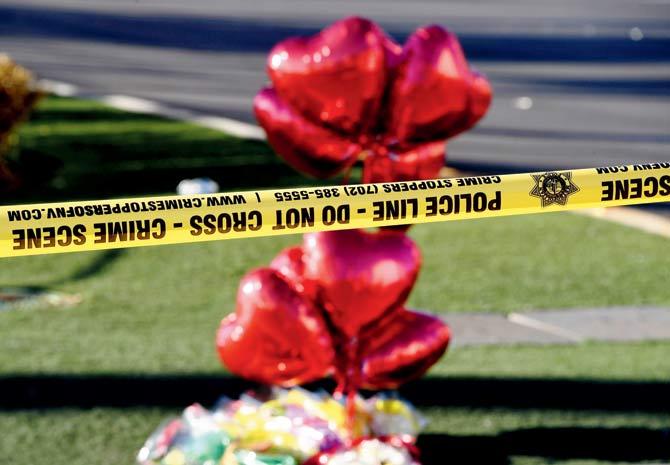 Crime scene tape and balloons outside the Route 91 festival venue after the mass shooting. Pics/AFP