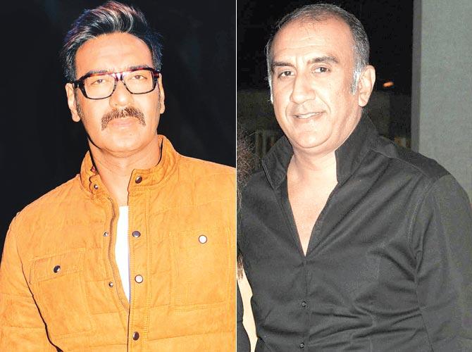 Ajay Devgn and Milan Luthria