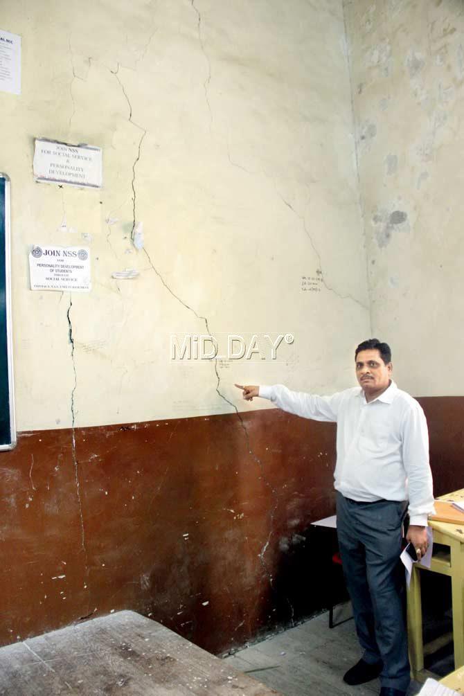 The principal of Siddharth College points to cracks on the college wall. He says while cracks have been around for a while, the Metro construction has led to their widening. In the basement, he says, a pillar fell recently
