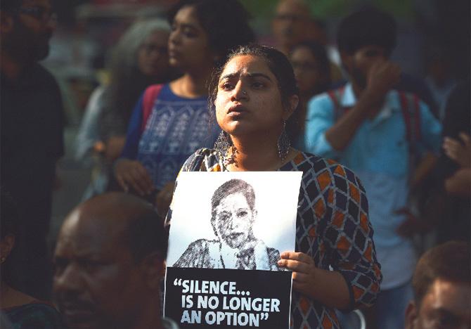 People participate in a protest called ‘Not In My Name’ against the killing of senior journalist Gauri Lankesh at Jantar Mantar on September 7, 2017 in New Delhi, India. Protests erupted across the city and some parts of the state condemning the "cold blooded murder" of journalist and activist Gauri Lankesh in Bengaluru. She was shot dead outside her house on 5th September night, sparking outrage from people of all walks of life. 