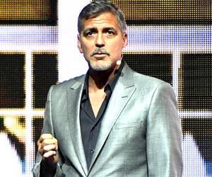 George Clooney afraid of breaking his twins