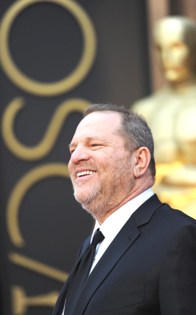 This file photo taken on March 2, 2014 shows producer Harvey Weinstein arriving on the red carpet for the 86th Academy Awards in Hollywood, California. The Academy of Motion Picture Arts and Sciences was in emergency session on October 14, 2017 to discuss kicking out Harvey Weinstein amid mounting sexual harassment, assault and rape accusations. An avalanche of claims have surfaced since the publication last week of an explosive New York Times report alleging a history of abusive behavior dating back decades. Pic/AFP