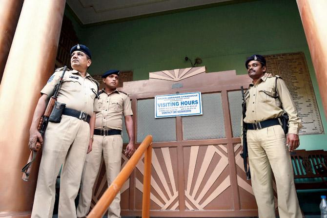 Cops keep vigil at the Magen Abraham Synagogue in Ahmedabad on Saturday, after it was revealed that the two suspected ISIS operatives arrested on Friday had allegedly planned to carry out a 
