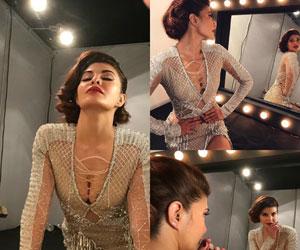 Stunning! Jacqueline Fernandez oozes oomph in this sheer gold dress