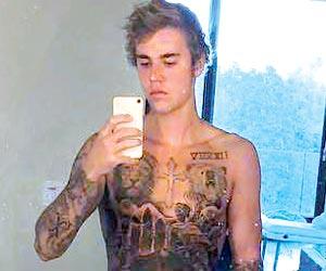 Justin Bieber gets his entire torso inked