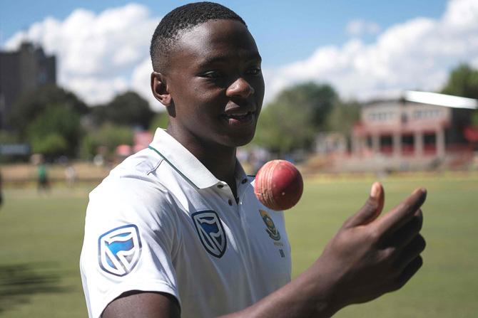 South Africa bowler Kagiso Rabada celebrates his 100 wickets in Test Matches playing with the ball after South Africa won at the end of the third day of the second Test Match between South Africa and Bangladesh in Bloemfontein, on October 08, 2017. Fast bowler Kagiso Rabada led a ruthless bowling performance as South Africa completed an innings and 254 run win on the third day of the second Test against Bangladesh at Mangaung Oval on October 8, 2017. Pic/AFP