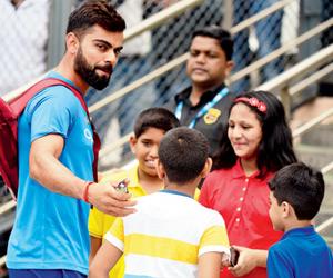IND vs NZ: Virat Kohli greets young fans at Wankhede Stadium