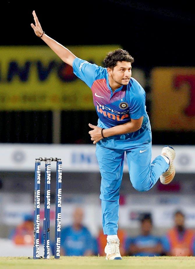 Kuldeep Yadav claimed two wickets for 16 runs in the first T20I against Australia on Saturday. Pic/PTI