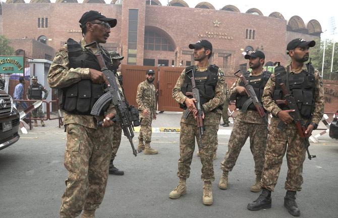 Pakistani troops stand guard at the main entrance of Gaddafi Stadium ahead of scheduled Twenty20 international cricket match between Pakistan and Sri Lanka, in Lahore, Pakistan, Saturday, Oct. 28, 2017. Pakistan will showcase its security capabilities to the cricketing world for the third time in eight months when Sri Lanka plays a Twenty20 international at the heavily guarded Gaddafi Stadium on Sunday. Pic/AP/PTI