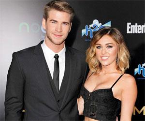 Miley Cyrus and Liam Hemsworth make rare red carpet appearance