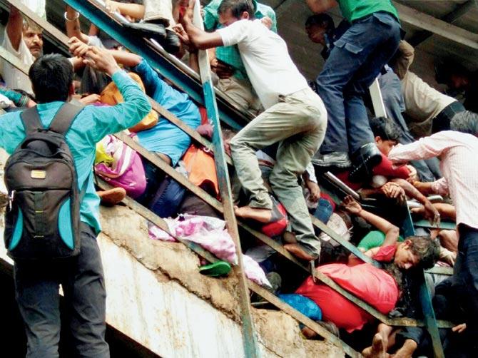 23 commuters died in a stampede on the narrow foot overbridge at Elphinstone Road station. File Pic