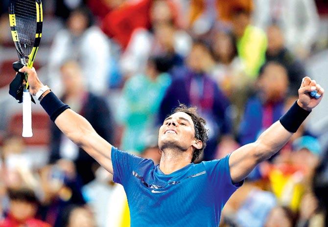 Rafael Nadal of Spain celebrates after defeating Lucas Pouille of France in men’s singles match of the China Open yesterday. Pic/AFP