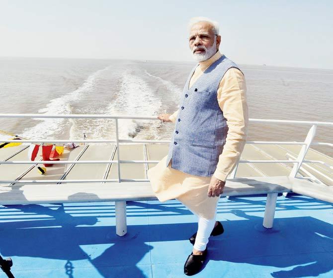 PM Narendra Modi on the maiden voyage of the Ro-Ro ferry service in Ghogha, Bhavnagar, during his visit to Gujarat on Sunday. Pic/PTI