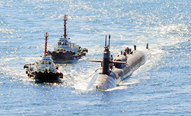 Nuclear-powered submarine USS Michigan approaches a naval base in Busan, South Korea, amid North Korea