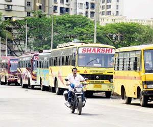 School bus staffers protest not being allowed to enter school premises