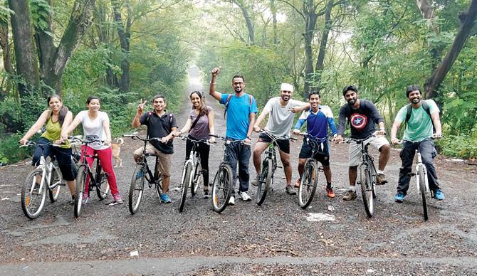 Cyclists on a ride through Aarey Colony