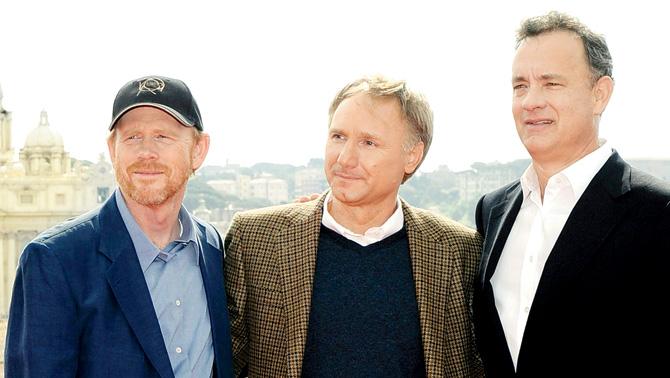 (From left) Director Ron Howard, Dan Brown and Tom Hanks, who plays Robert Langdon. Pic/AFP