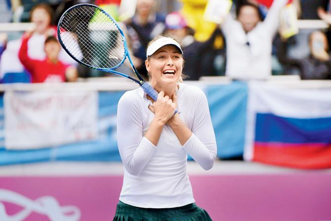 Maria Sharapova is ecstatic after winning Tianjin Open final. Pic/AFP