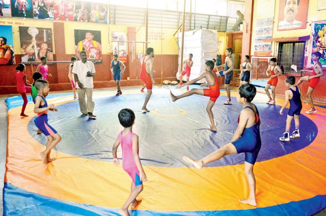 Shree Ganesh Akhara currently trains 70 children, of whom 15 are girls. Training at the academy takes place twice a day, with the first class beginning as early as 5 am. Pics/Falguni Agrawal