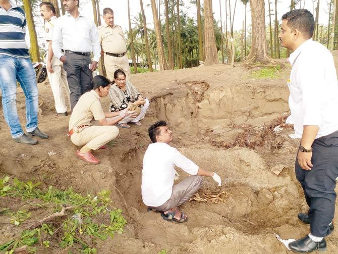 Cops dig out the skeletal remains and carry out a panchnama at Kelwa beach, where locals had spotted the bones sticking out of the ground
