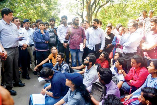 More than 50 students and parents gathered in protest outside the Examination House at Mumbai University