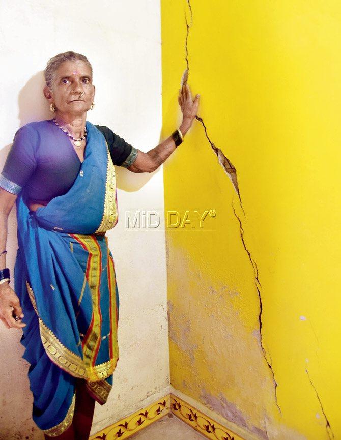 Anusaya Jadhav Madvi, who has been living in the village for 60 years, says the houses there never developed cracks except until now. Pics/Sameer Markande