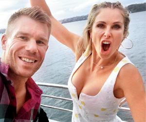 David Warner turns romantic with wife Candice at Sydney harbour