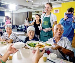 Caroline Wozniacki serves food to elderly, admits she's 'not a good cook'
