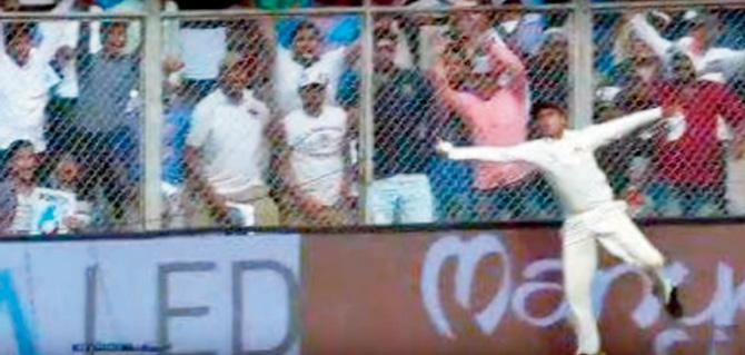 A screen grab of Aayush Zimre holding on to a catch offered by Virat Kohli yesterday