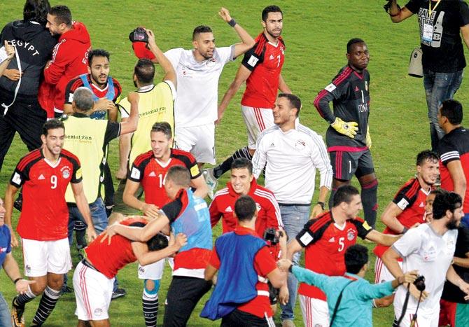 Egypt players celebrate after qualifying for the 2018 World  Cup on Sunday. Pic/AFP