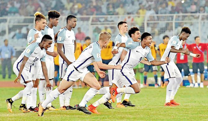 England players celebrate their win over Japan in penalty shootout during the FIFA U-17 World Cup Last-16 match yesterday. Pic/PTI