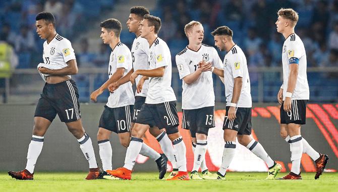 German players celebrate their team’s fourth goal against Colombia during the FIFA U-17 World Cup match yesterday. Pic/Getty Images