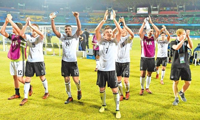 Germany players acknowledge fans after their 3-1 win over Guinea in the FIFA U-17 World Cup match at Kochi yesterday. Pic/Getty Images