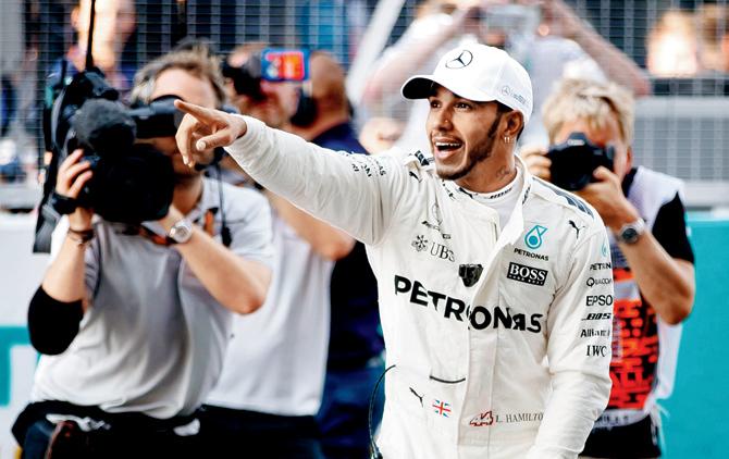 Lewis Hamilton after claiming pole in Sepang on Saturday. Pic/AFP