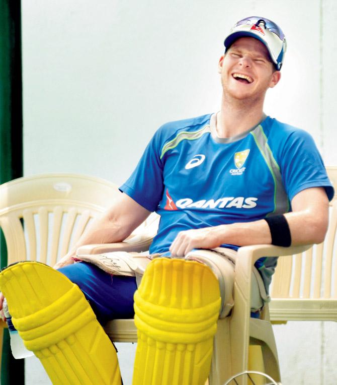 Oz skipper Steven Smith is cheerful during a practice session in Nagpur. Pic/PTI