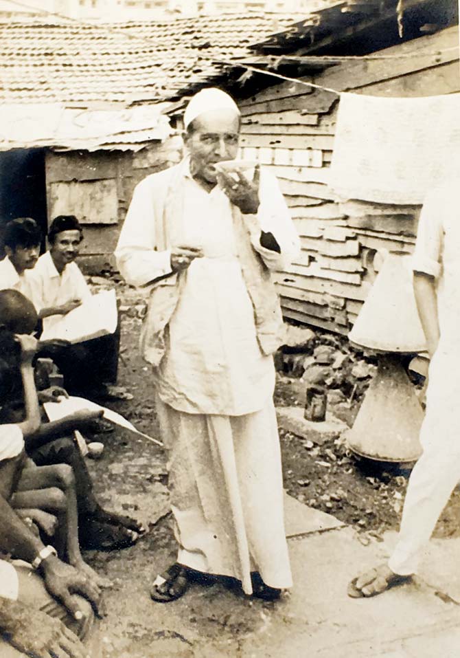 An archival photograph of Ibrahim Janmohammed Patel, grandfather of Rais Patel, fourth generation descendant of the mujawwar family, showing Ibrahim sipping chai outside Barkat Ali Dargah on Antop Hill. Pic Courtesy/Waheeda Patel