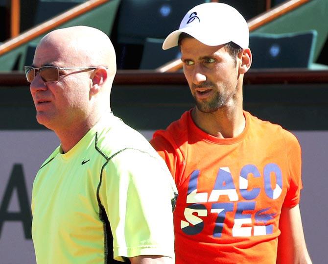 Novak Djokovic and Andre Agassi. Pic/AFP