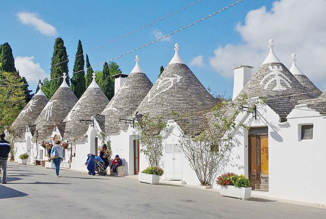 Alberobello village was recognised as a UNESCO World Heritage site in 1996 for its trulli - whitewashed dwellings capped with conical roofs