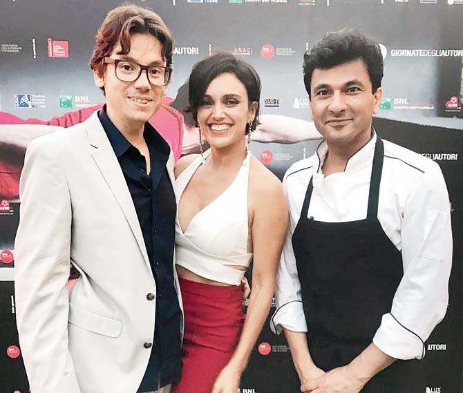 Andrei Severnei, his wife and Vikas Khanna
