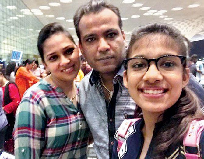 Anshika with her parents