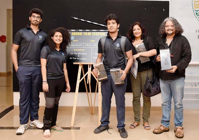 (From left) Student organisers Aravind Raju, Devi Dang, Partho with parents Deepa Bhatia and Amol Gupte