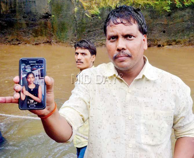 Ashok Jaiswal shows a picture of Gauri. Pic/Datta Kumbhar